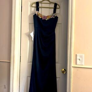 Navy long gown with slit beautiful detailed flowers along straight-neckline NWT.